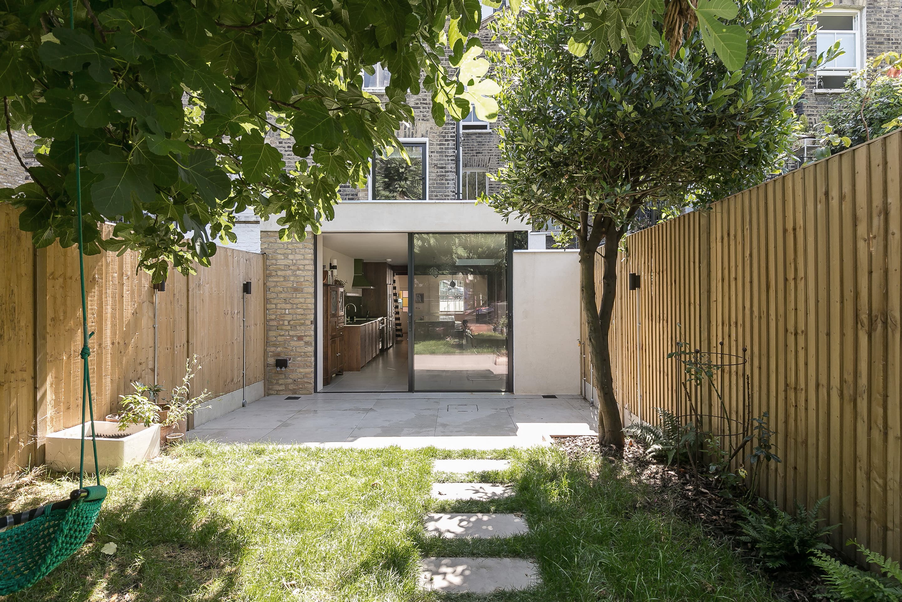 The extended house viewed through the garden.