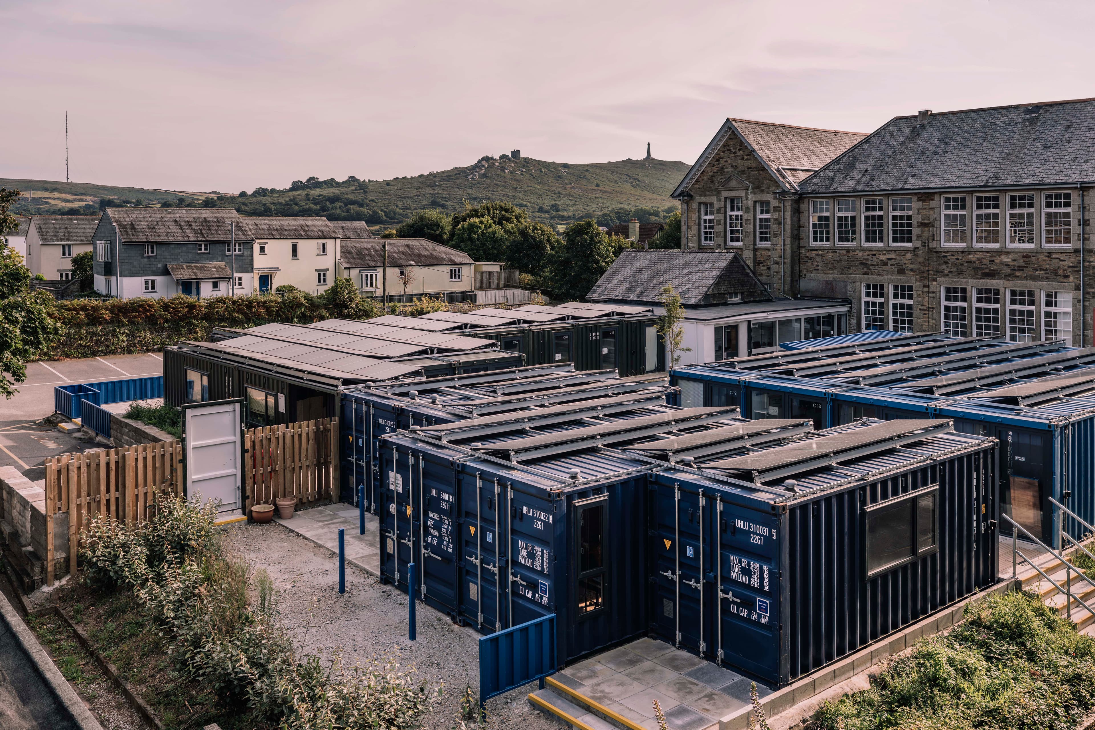 The container studios sit beside Krowji’s existing buildings.