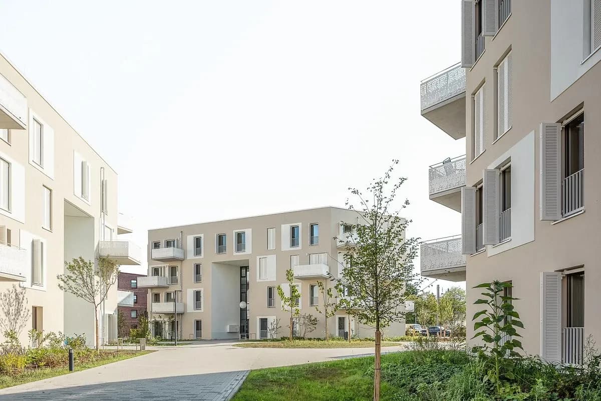 Balconies and white shutters line the edges of the shared courtyard.