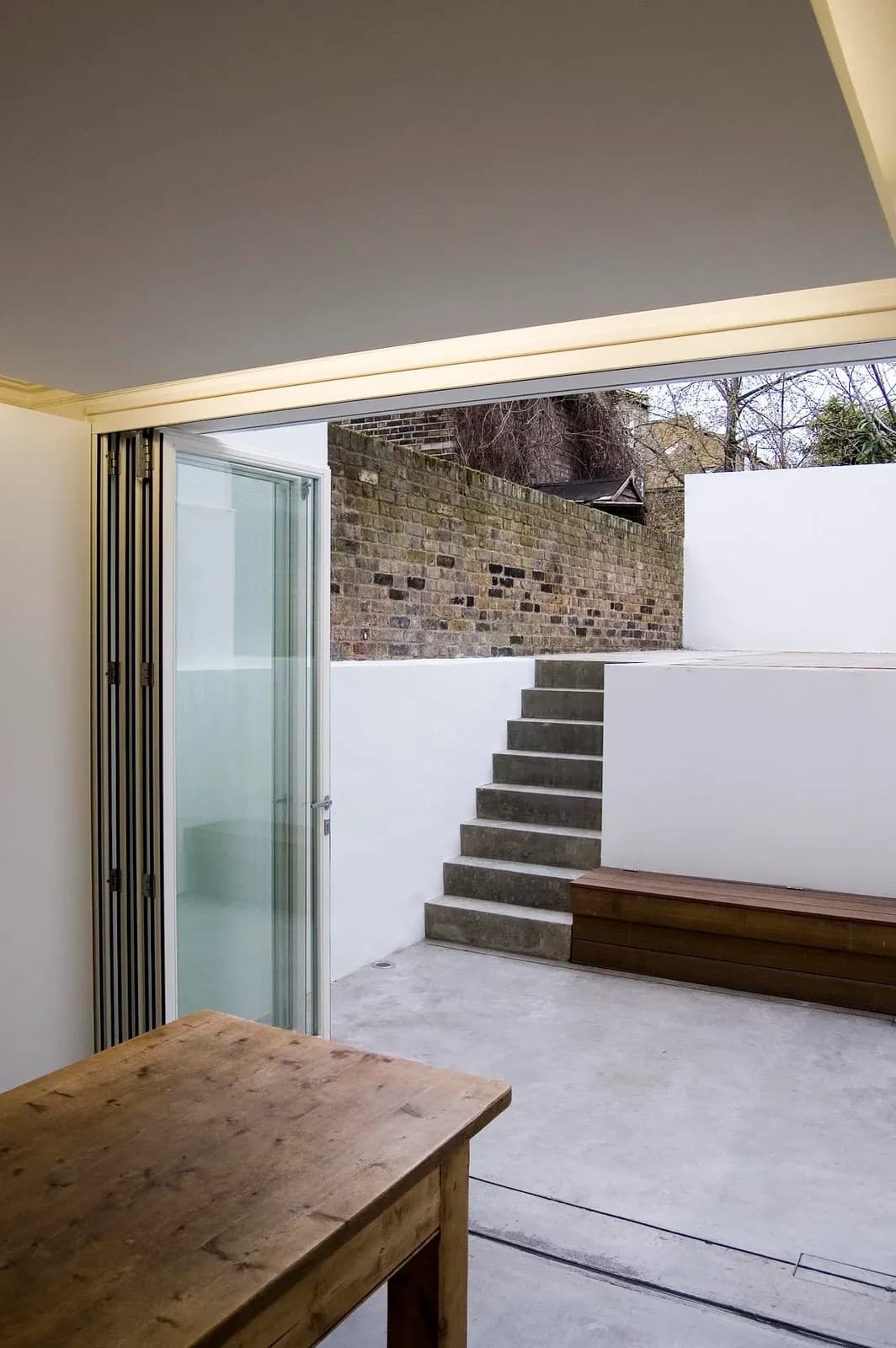 The courtyard steps and brick boundary are visible from inside Periscope.