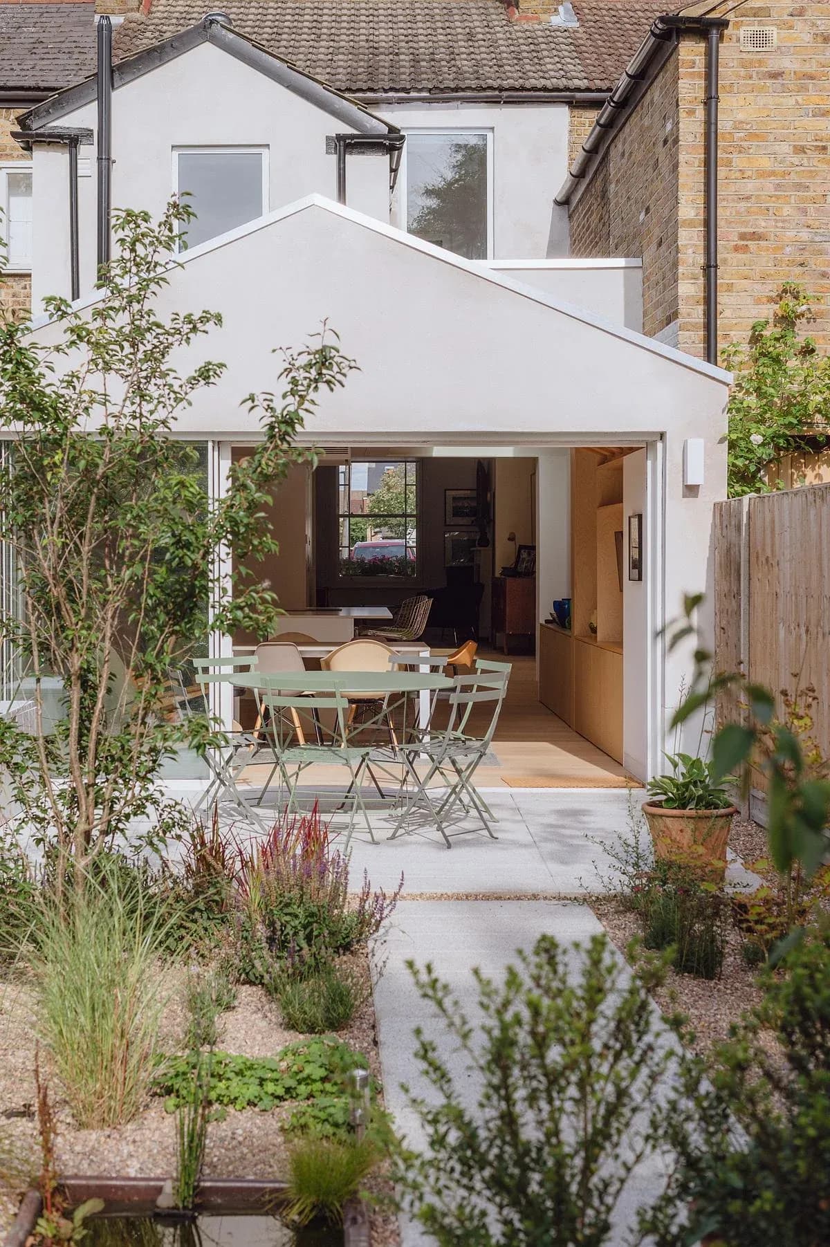 The rear extension opens onto the planted prairie garden.