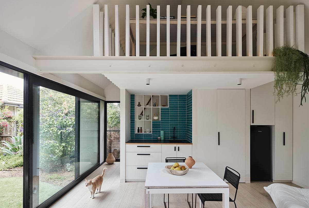 The kitchenette and mezzanine sit within one compact interior.