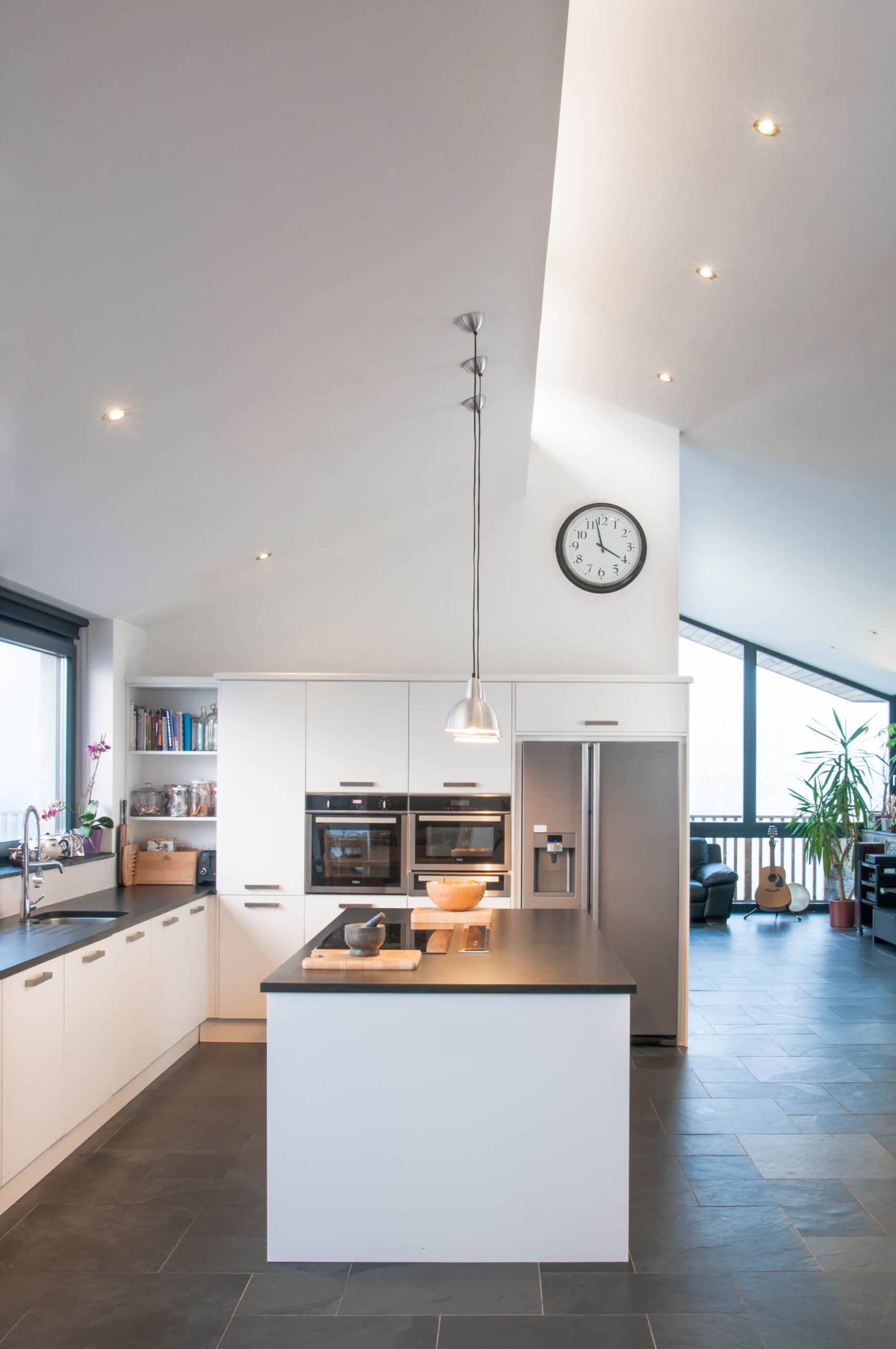 Kitchen beneath the roof structure.