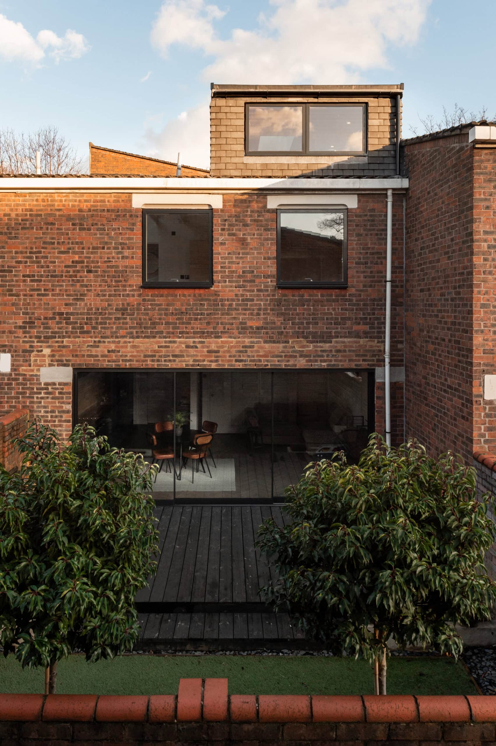 Rear brick facade of the house.