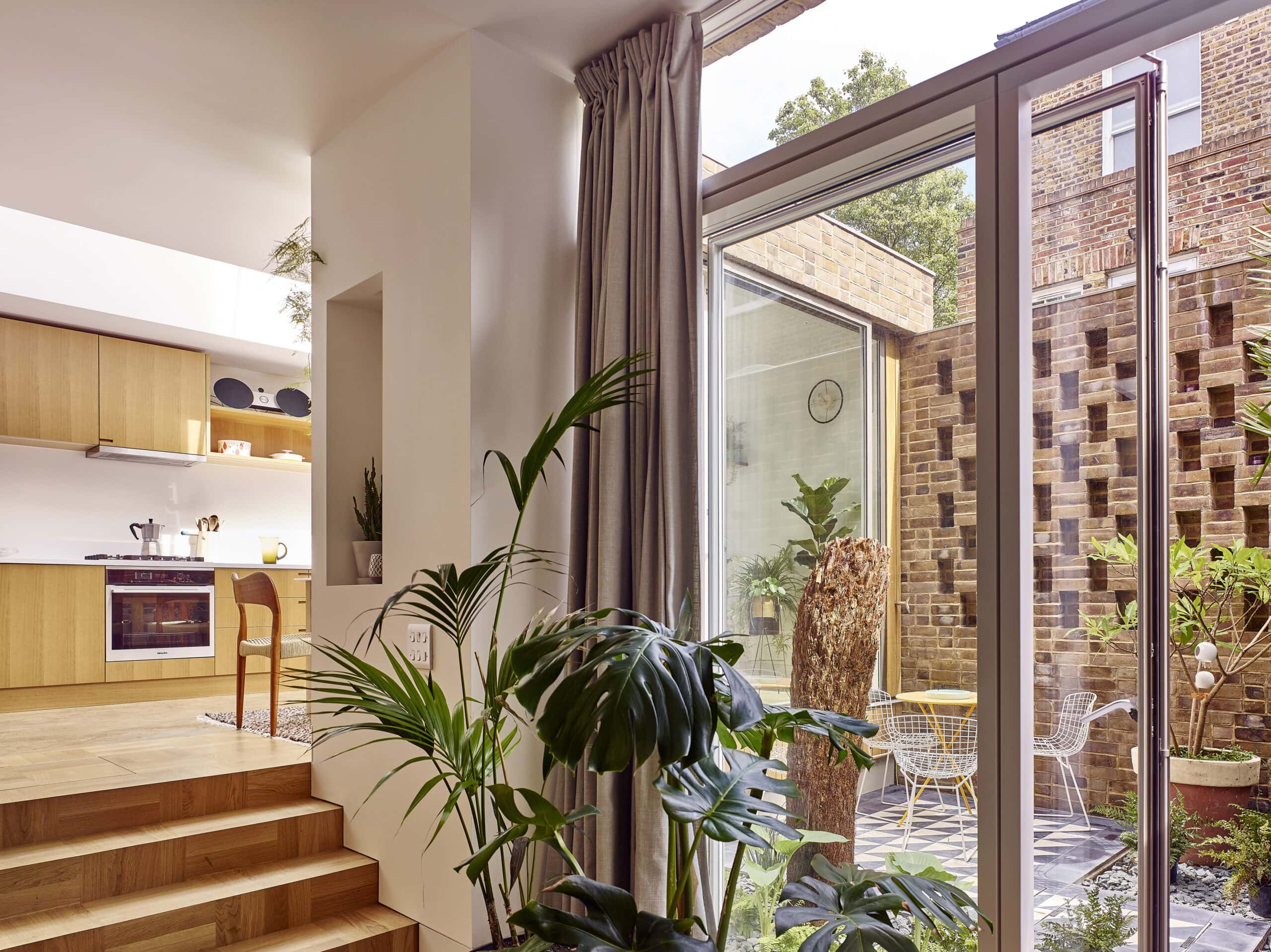 Courtyard glazing beside the kitchen steps.