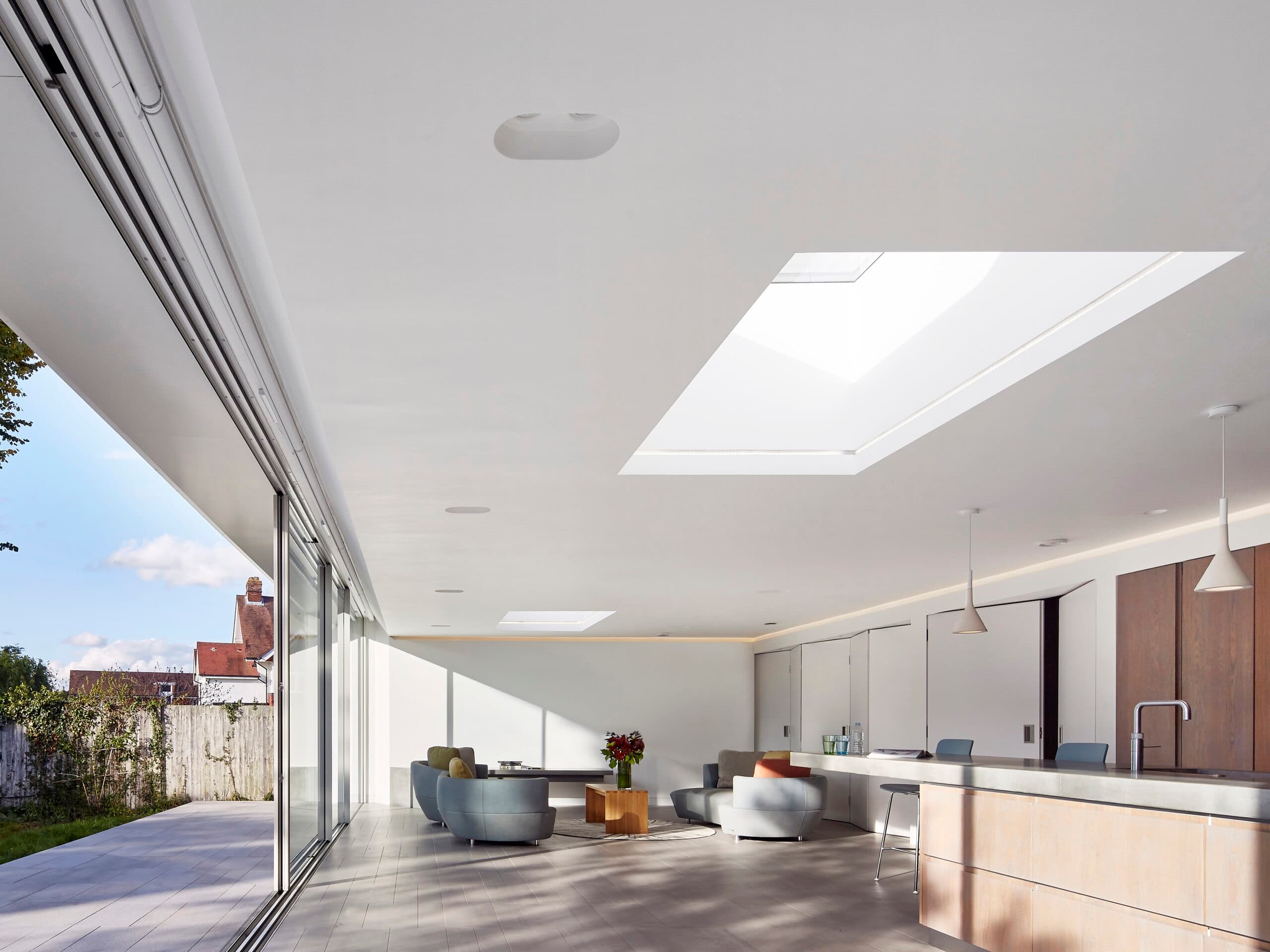 Interior beside the wide glazed garden wall.