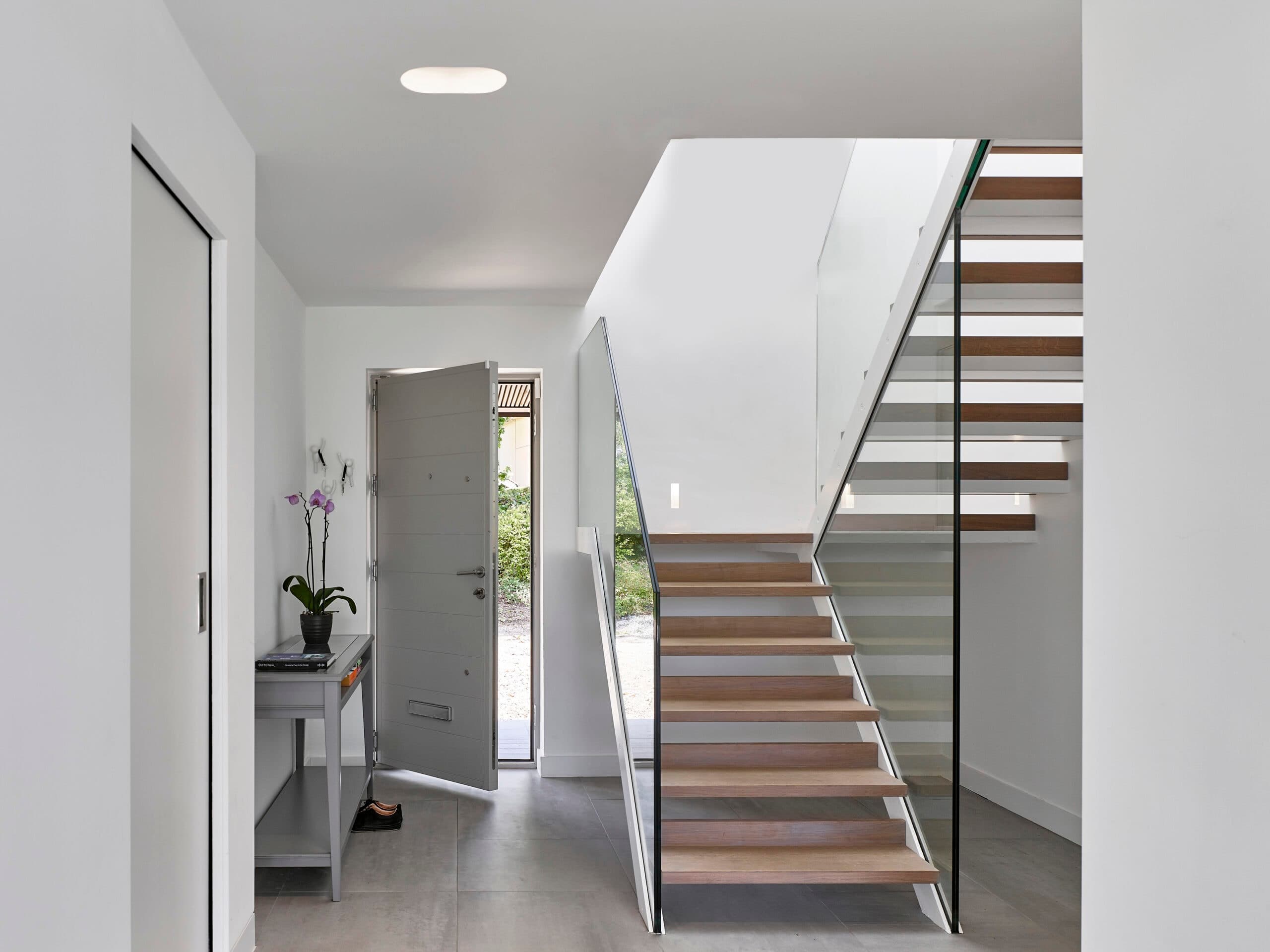 White stair with timber treads.