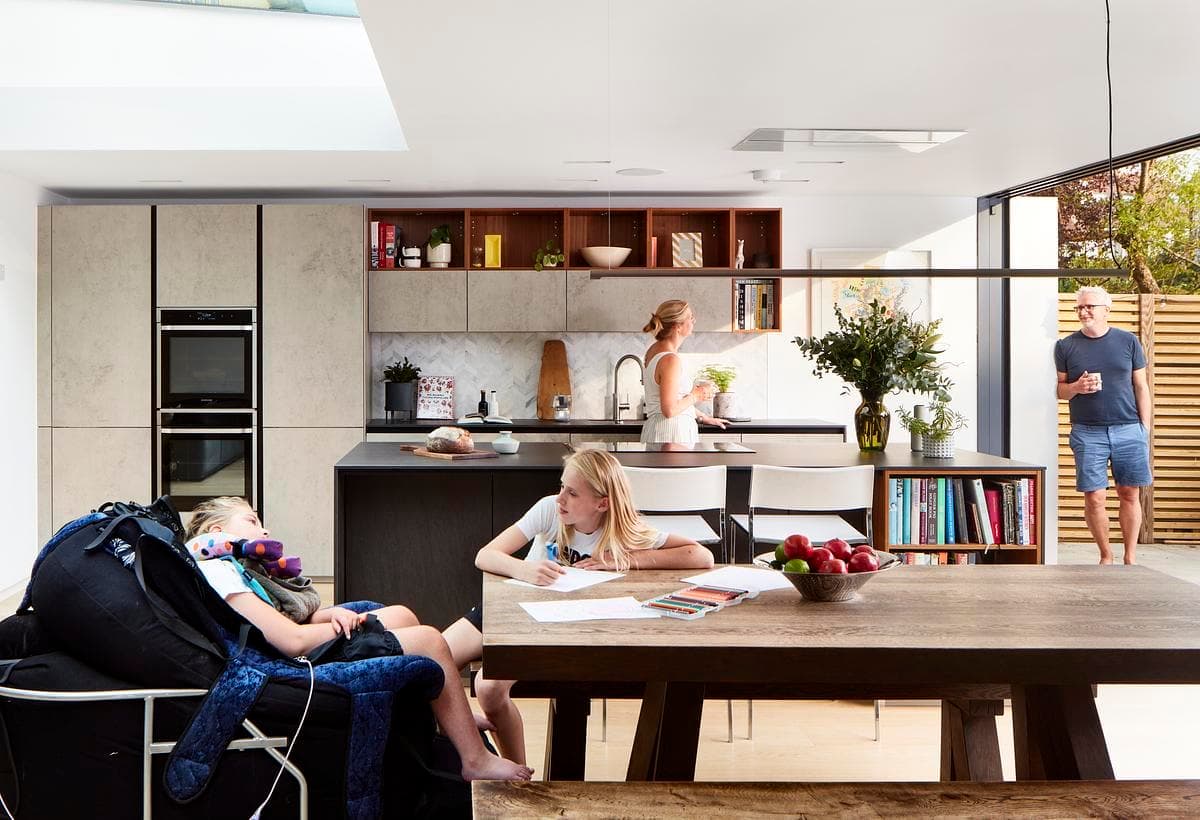 Open-plan kitchen and living space opening towards the garden.
