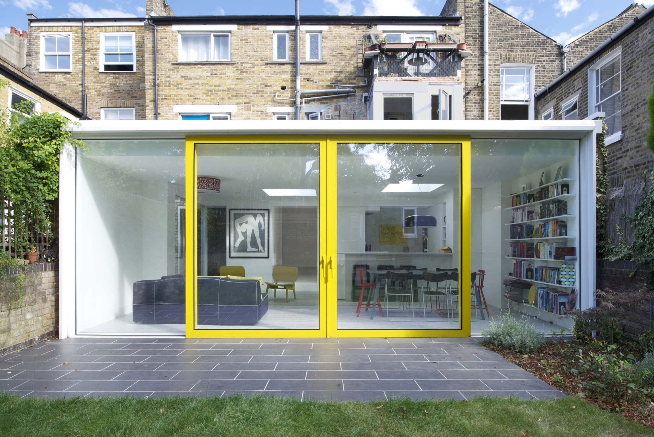 Rear facade with yellow-framed glazing closed.