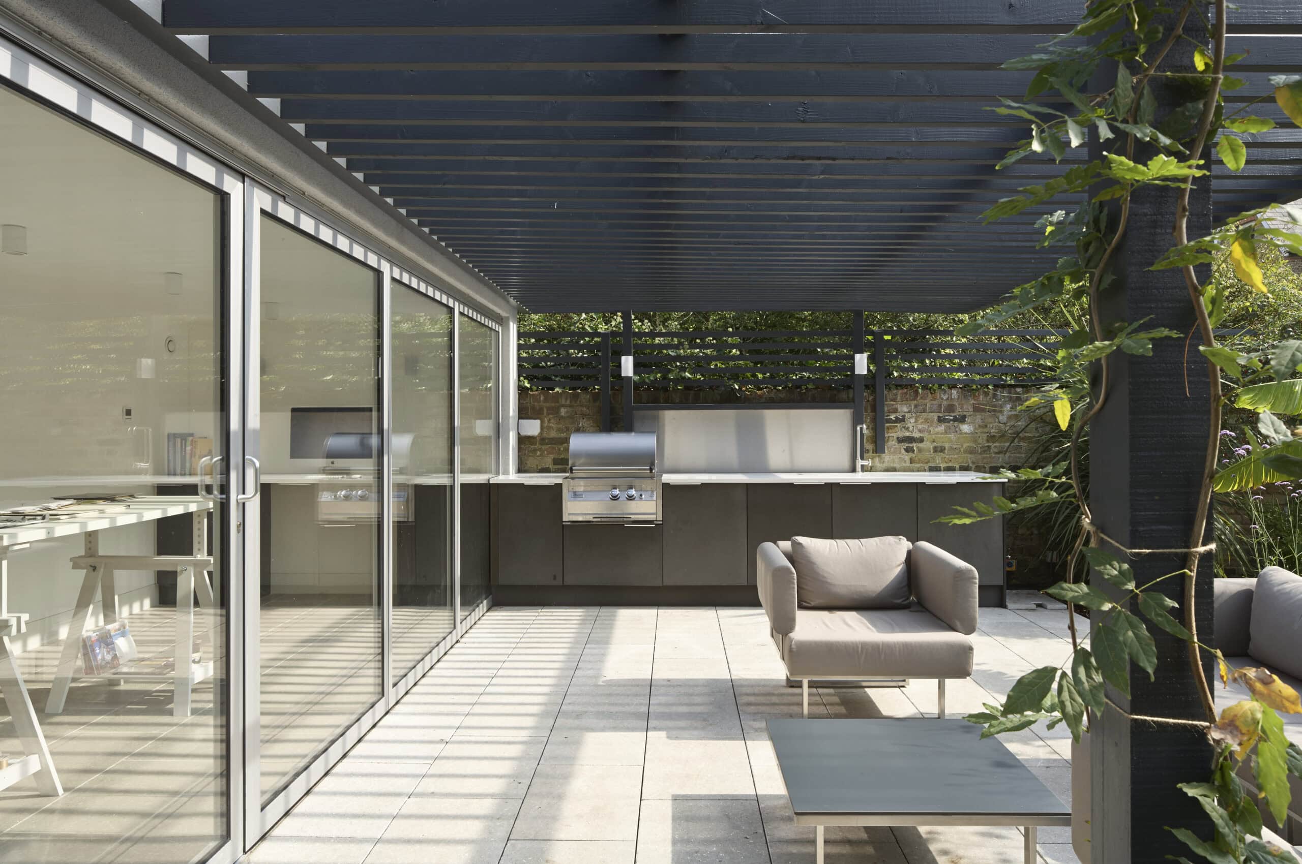 Pergola above the outdoor kitchen.
