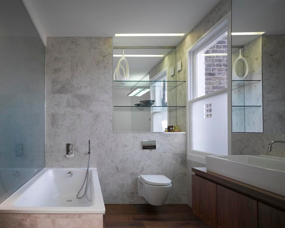 Bathroom with wall-mounted fittings.