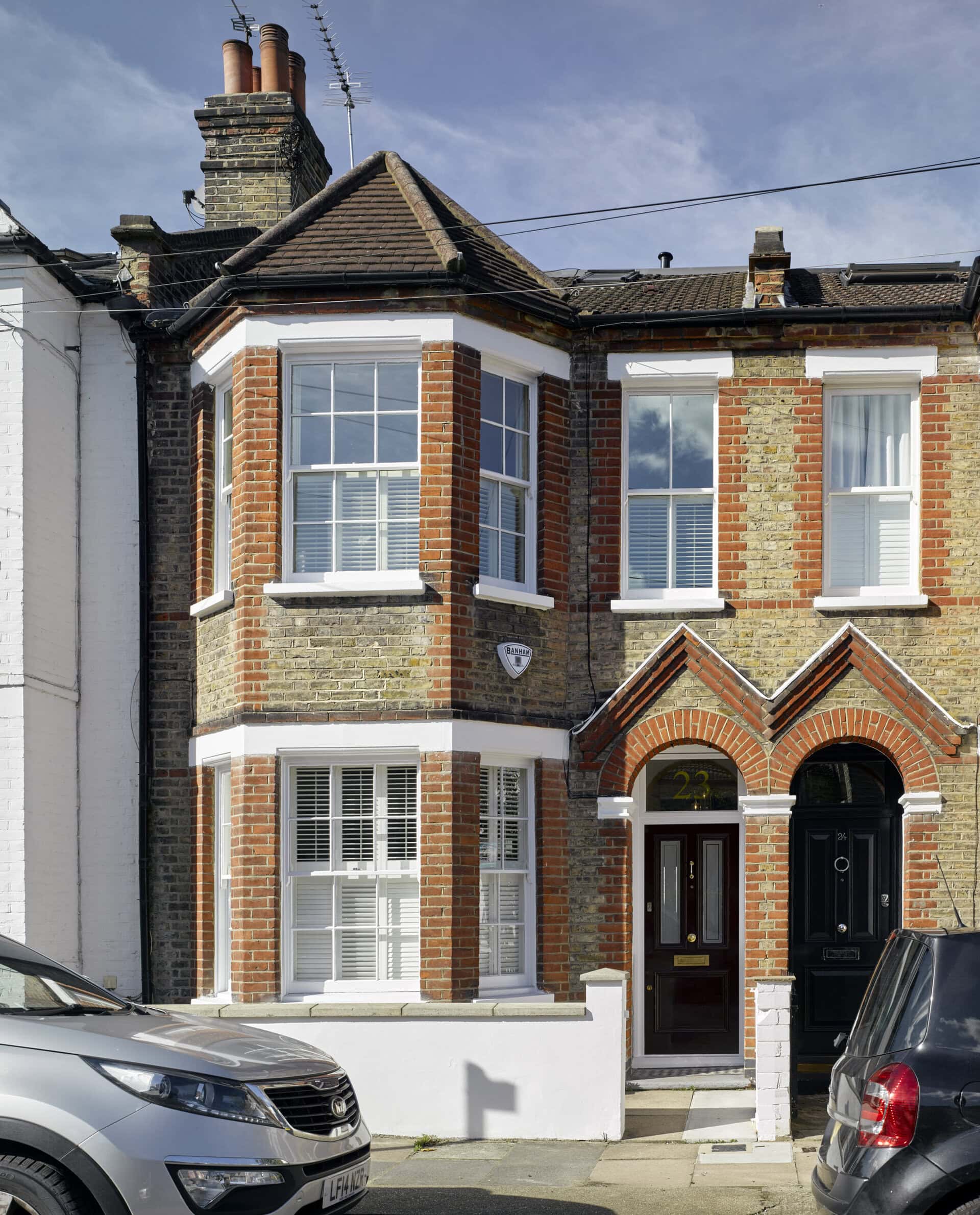 Front facade in its terraced street setting.