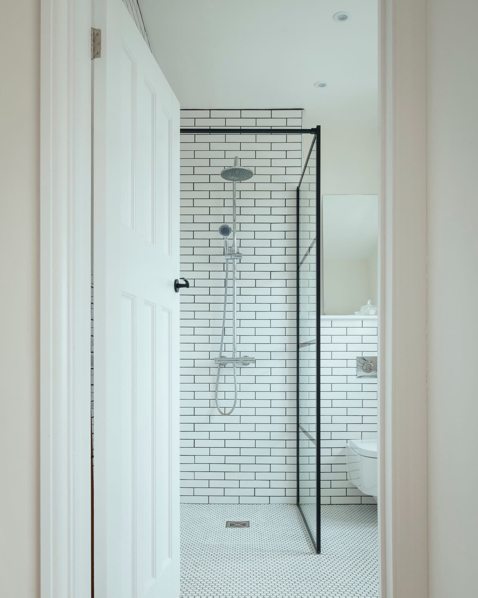 Bathroom doorway and interior.
