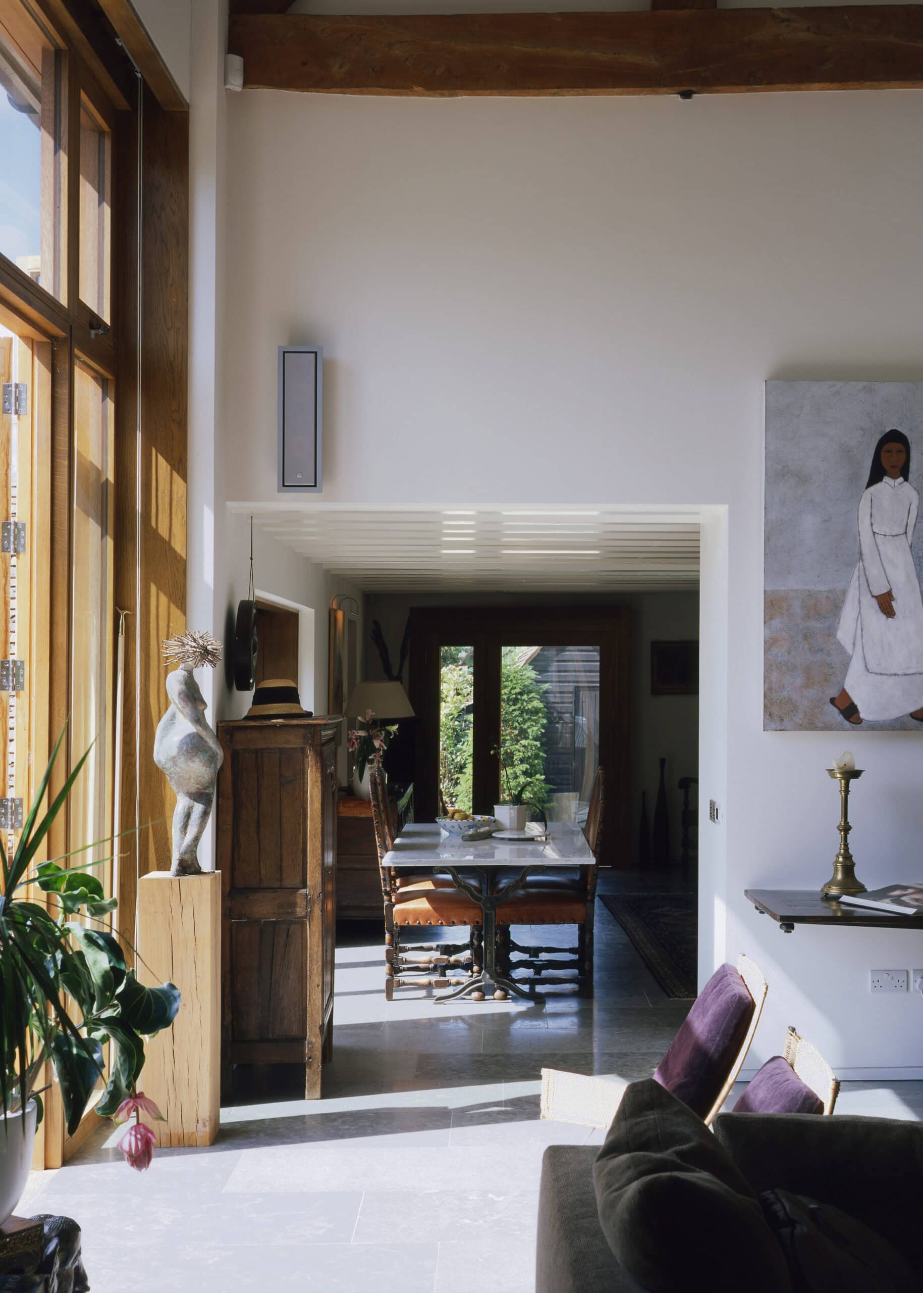 Living space beside tall glazing.