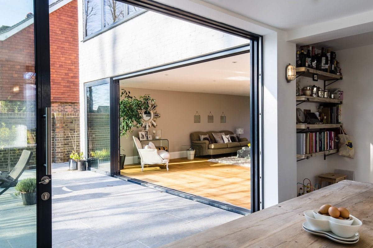 Modern open-concept living space blending indoor and outdoor areas with abundant natural light.