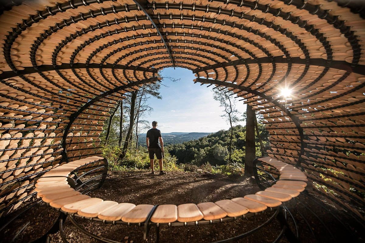 Serene wooden structure in nature, perfect for relaxation and contemplation amidst scenic views.