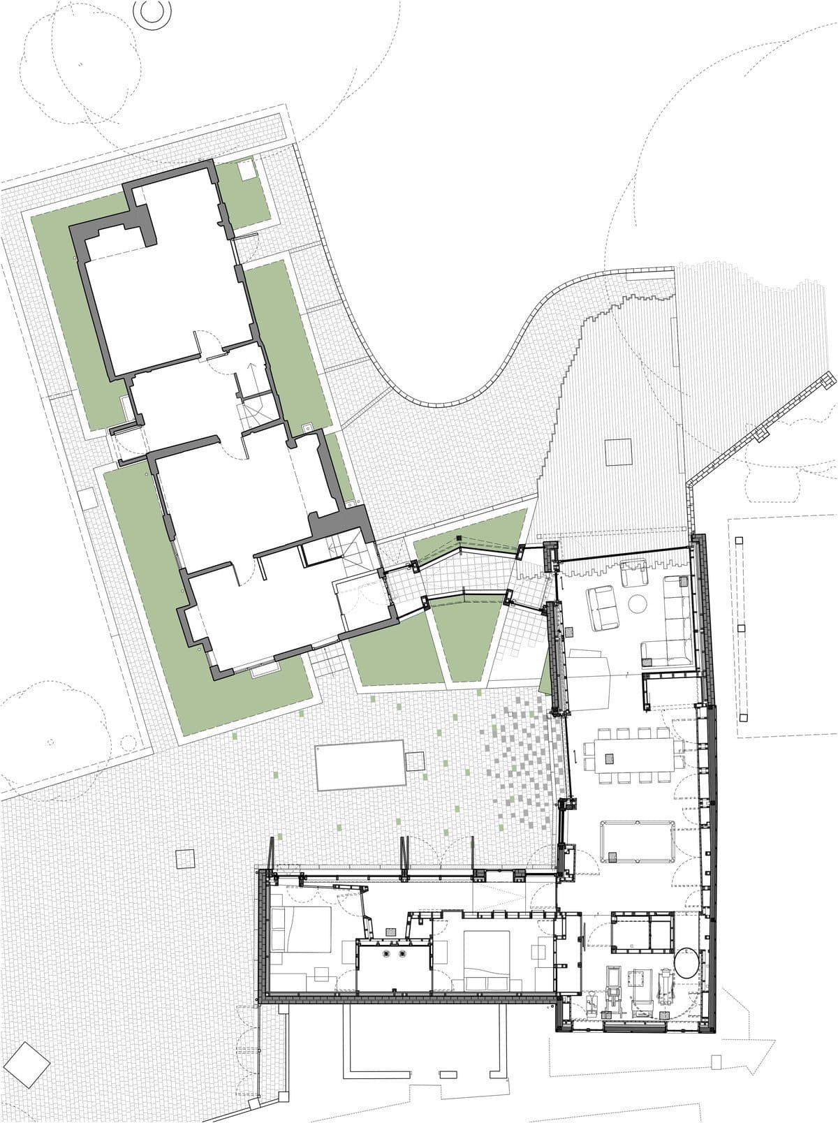 Architectural floor plan with green-highlighted areas, connected pathways, and multiple functional sections.