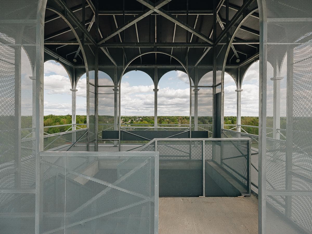 Sleek lookout tower blending industrial design with stunning natural vistas.