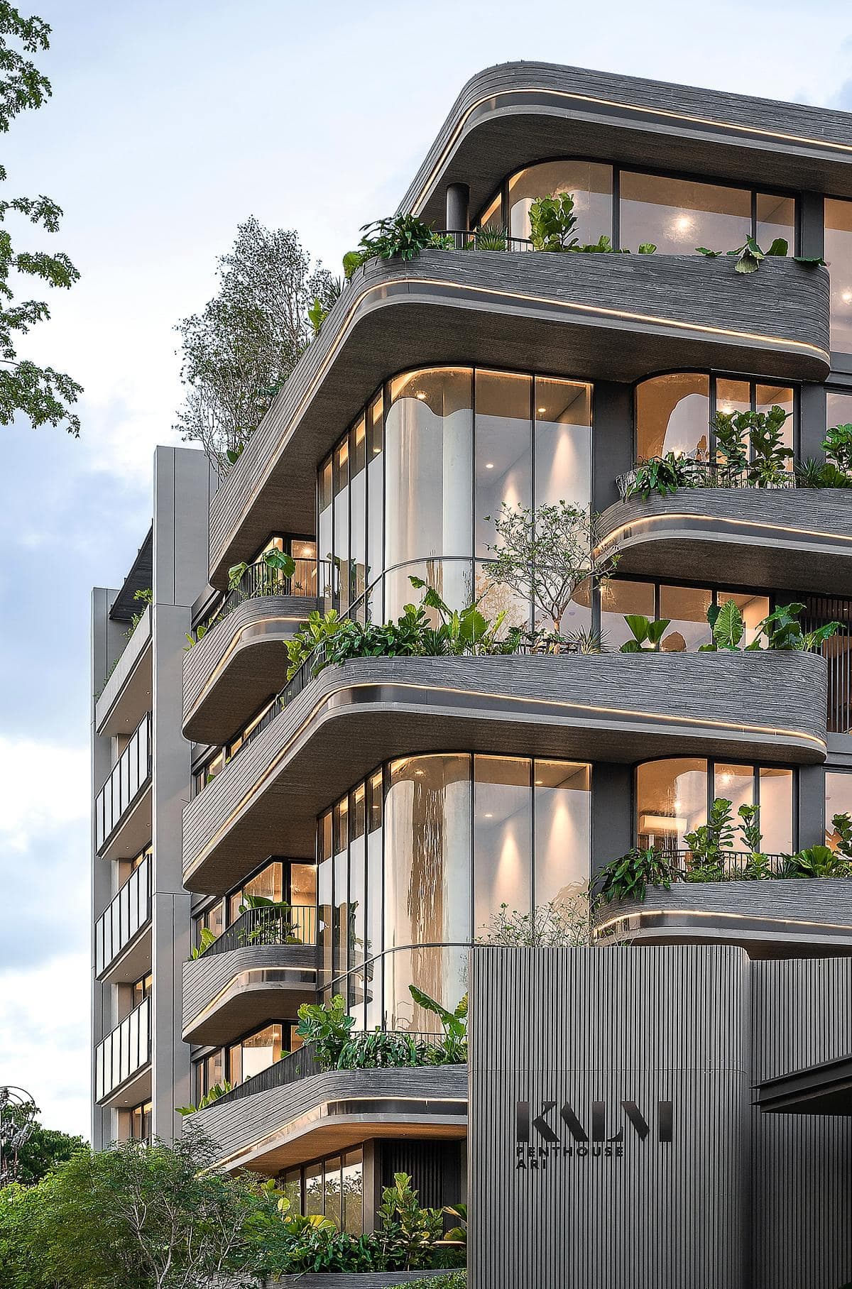 Modern penthouse with greenery, glass windows, and balconies. Luxurious, nature-integrated urban living.