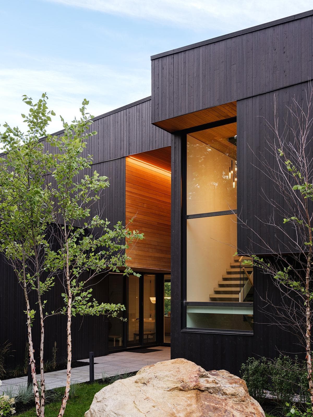Contemporary home design harmonising natural elements with elegant architecture and inviting interiors.