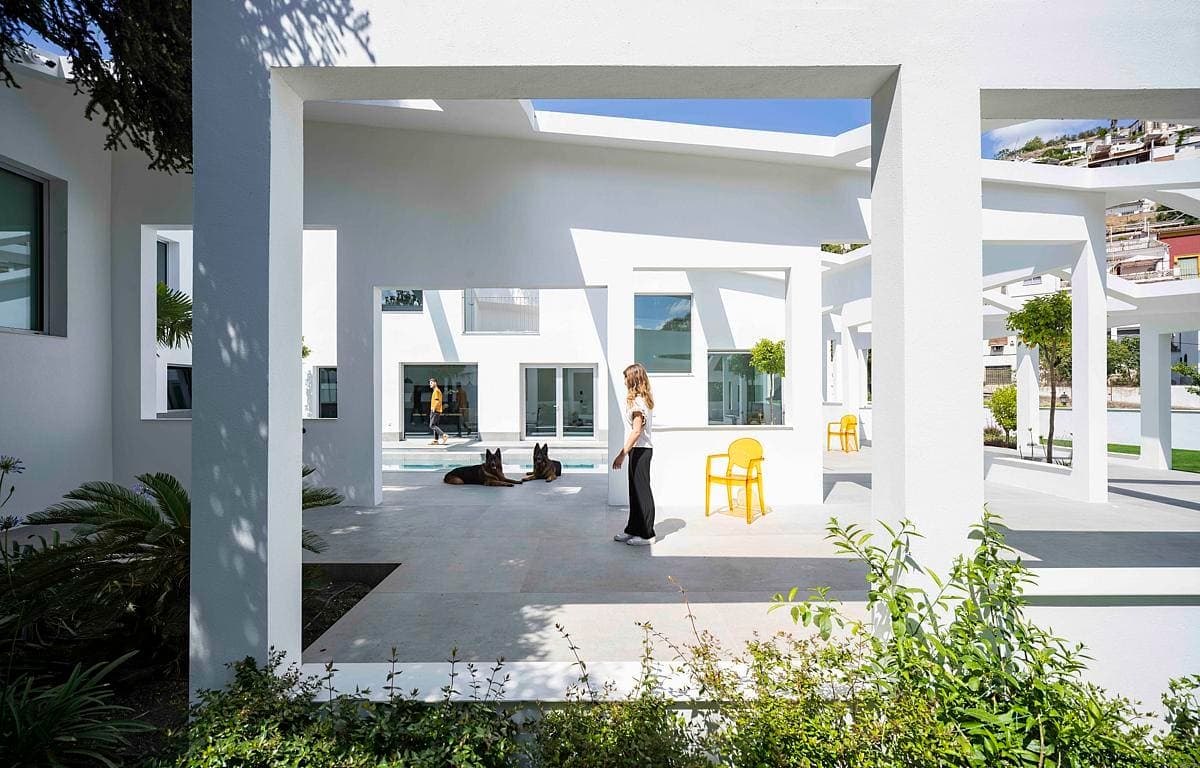 Tranquil modern architecture blending with nature, featuring clean lines and a serene atmosphere.