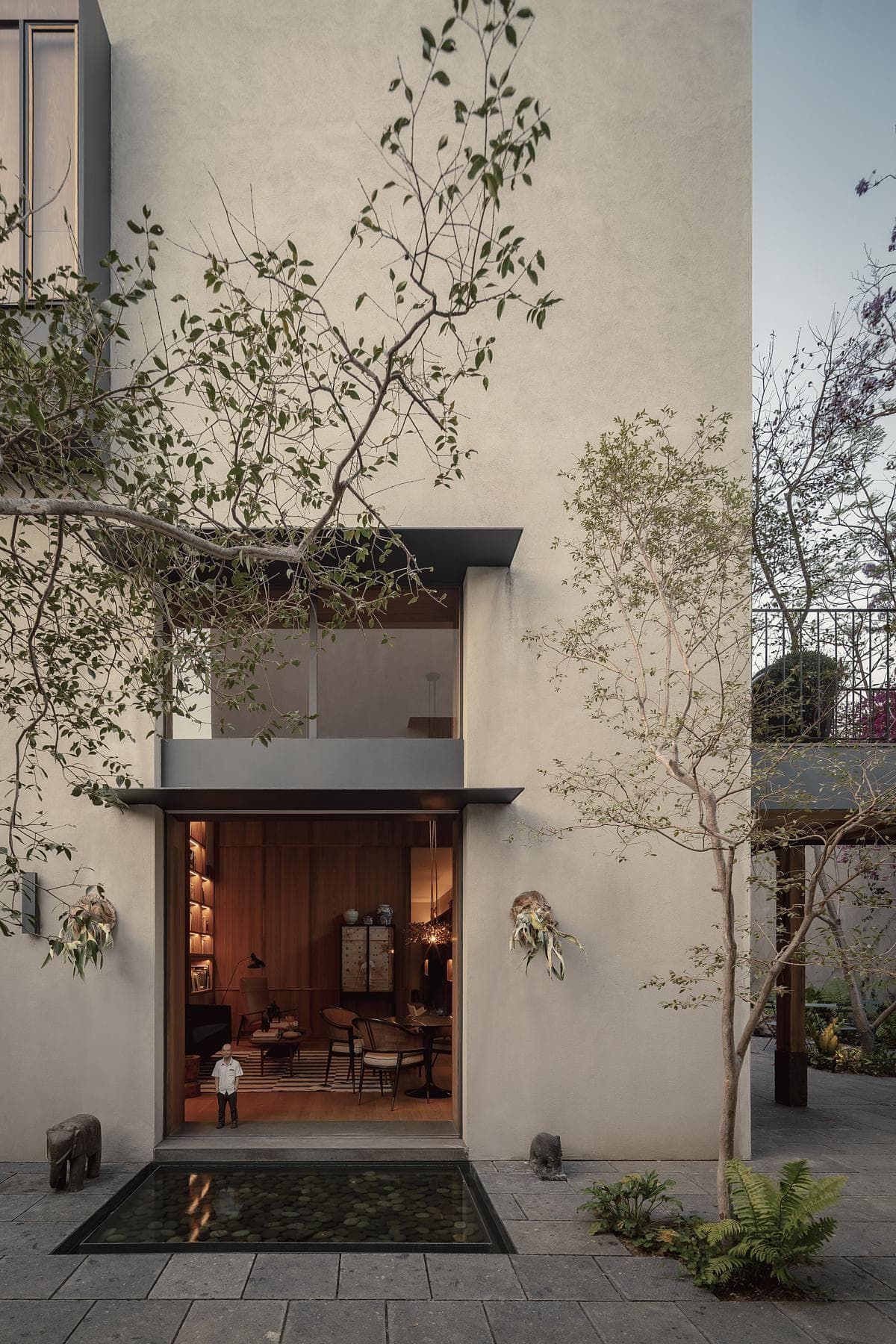 Serene modern home design blending indoor comfort with outdoor tranquility in harmonious architecture.