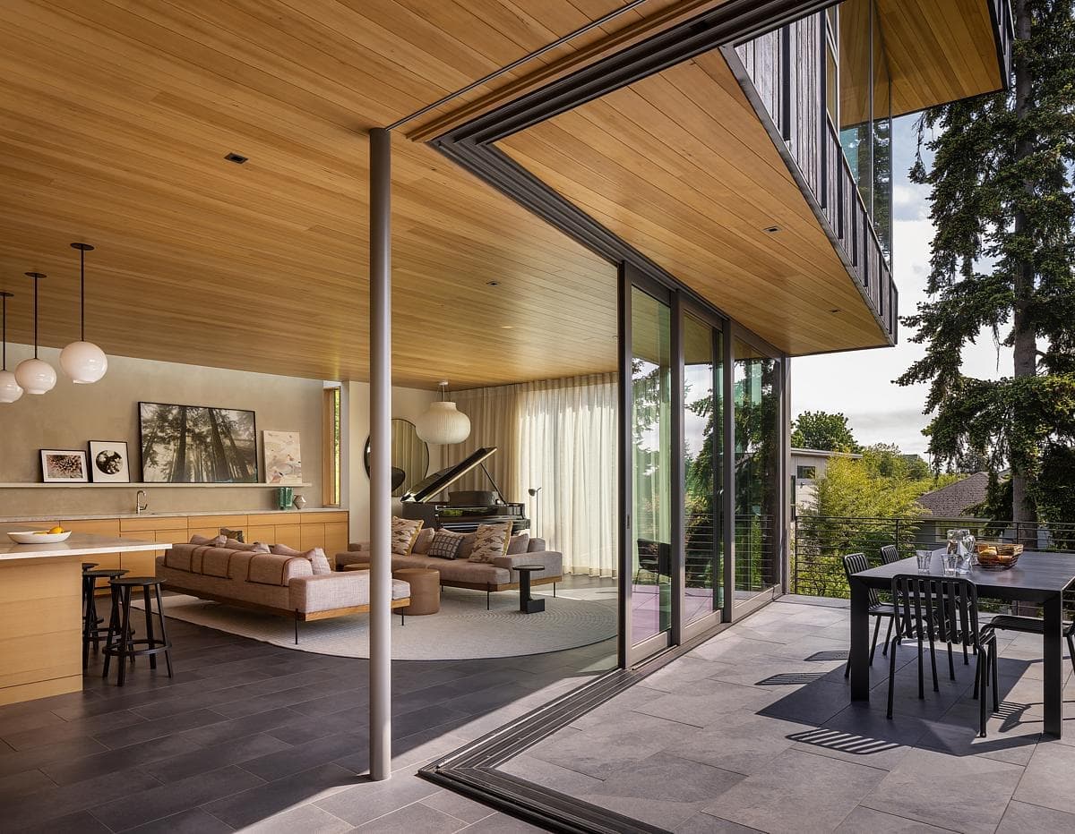 Contemporary home design with seamless indoor-outdoor living and elegant, natural elements.