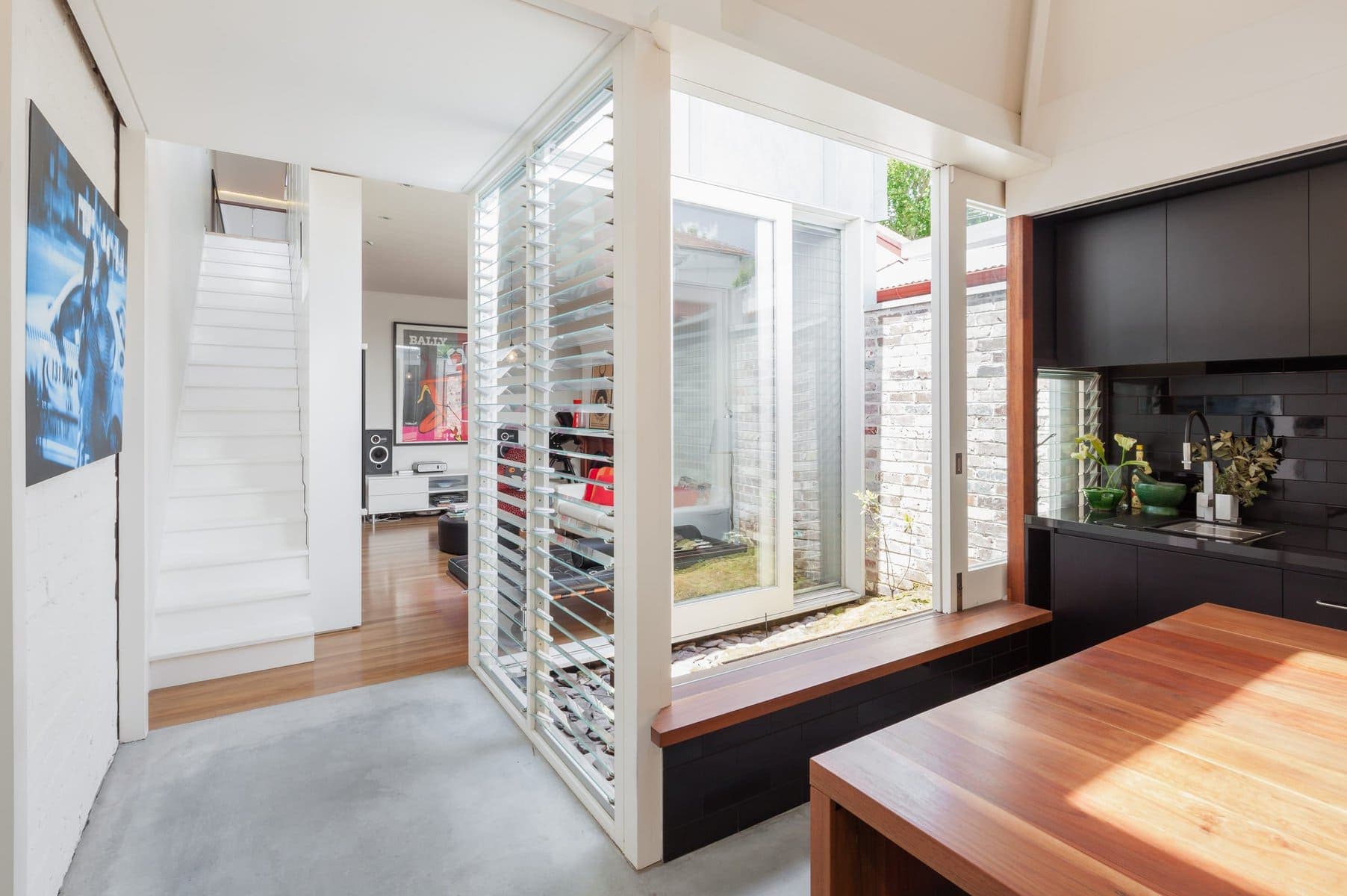 Stylish modern interior featuring natural light, elegant design, and a seamless connection to outdoor spaces.