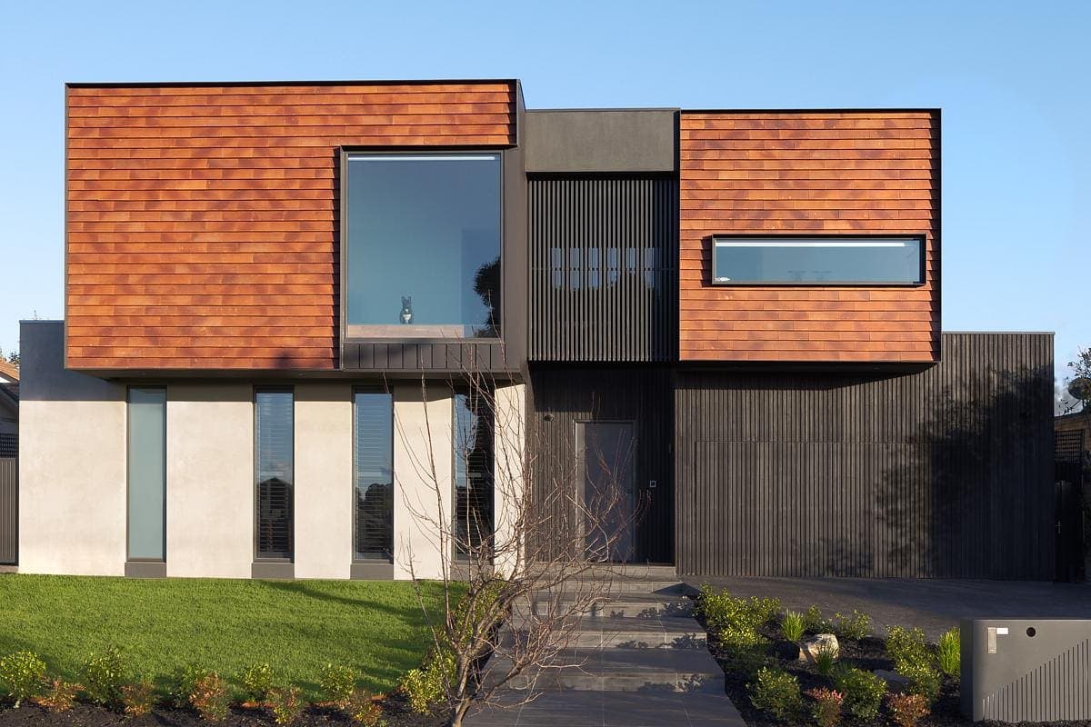 Modern residential architecture featuring bold design, striking materials, and seamless outdoor integration.