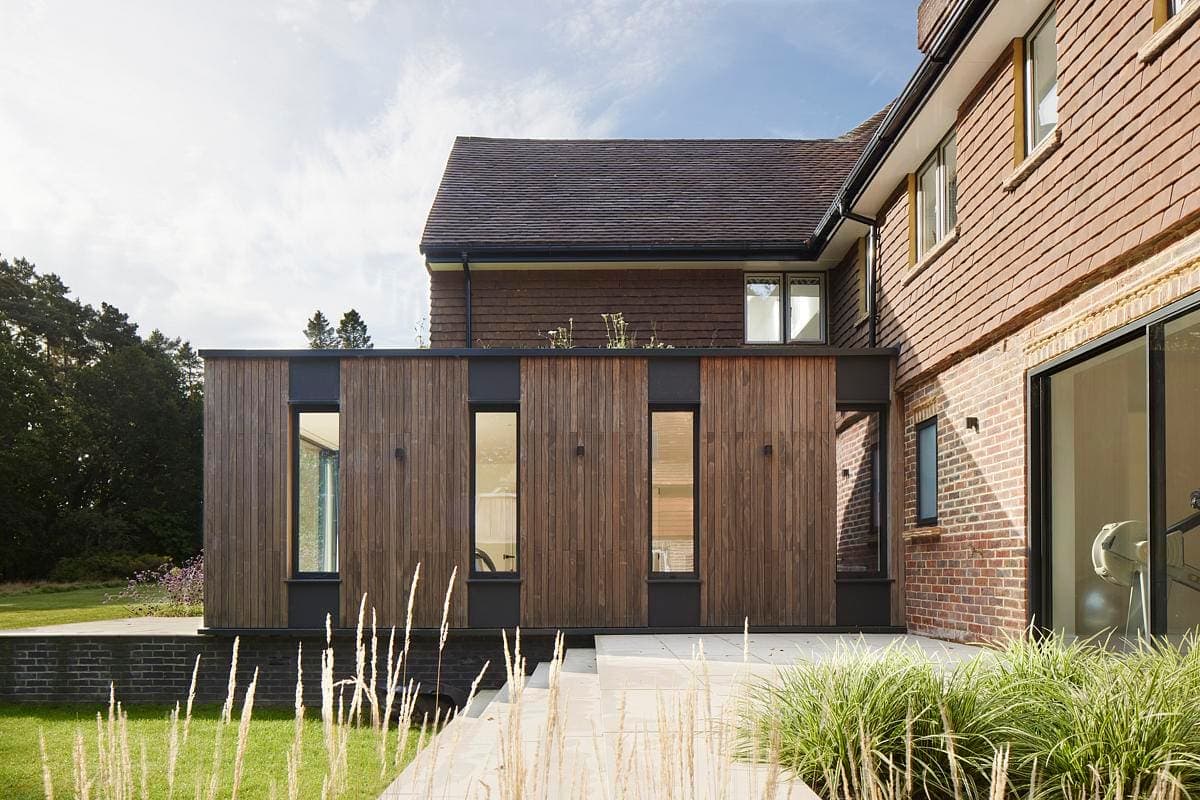 Contemporary home extension harmonises traditional architecture with modern design elements.