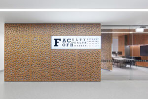 Deakin University Optometry Clinic interior with perforated bamboo panelling