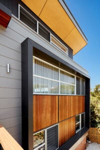 Three-storey home in Queenscliff with natural material palette, by Hobbs Jamieson Architecture