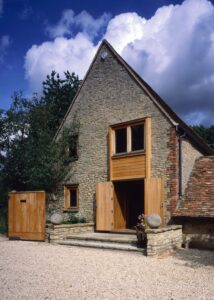 Barn Conversion by KSR Architects, Oxfordshire — barn exterior with timber cladding