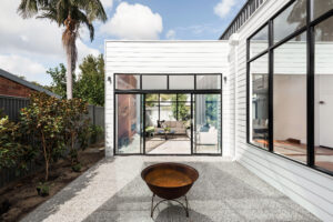 Pinterest House by Sandy Anghie Architect, central corridor with view of courtyard