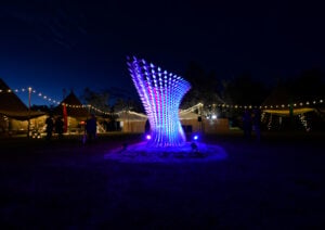 Meffigy participatory sculpture illuminated at night, by UnitedMake