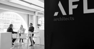 Professional meeting at AFL Architects modern office.
