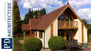 Modern cottage-style house with red clay roof in lush landscape.