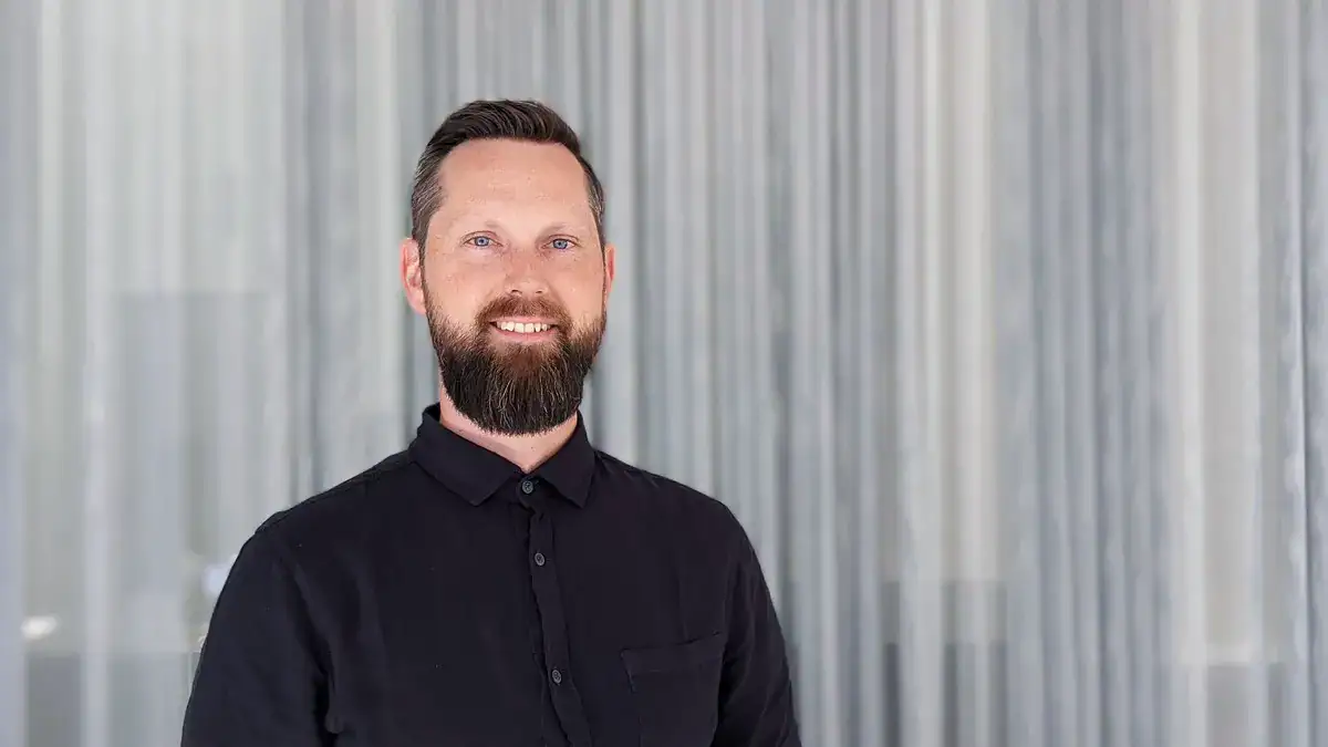 Friendly professional portrait of Martin Bradbury with a warm smile and approachable demeanor.