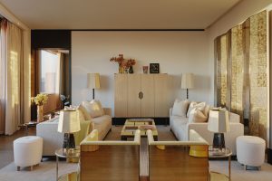 Elegant modern living room with neutral tones, plush sofas, and sophisticated decor.